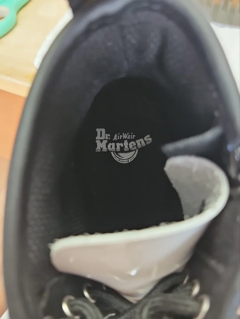 Dr. Martens White Patent Lace-Up Boots with Black Laces